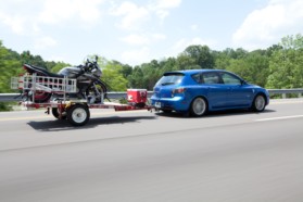 Trailer and Mazda 3